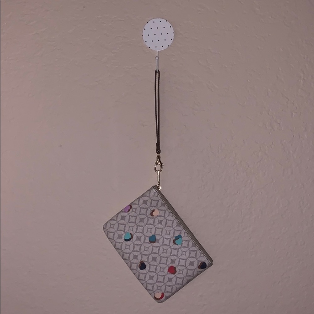 Small Signature With Heart Print Fossil Clutch. - image 1